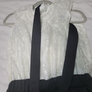 Romper, lace, cream and black, size medium. Never worn